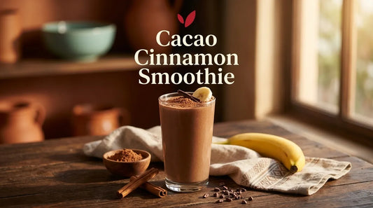 Mexican cacao cinnamon smoothie in a tall glass with cinnamon sticks, cacao powder and banana - Cacao Cinnamon Smoothie cover
