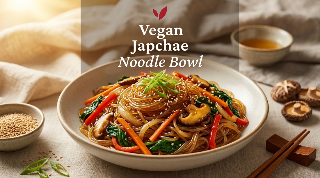 Vegan Japchae Korean Glass Noodle Bowl - glossy translucent sweet potato starch noodles tossed with colorful julienned vegetables and sesame