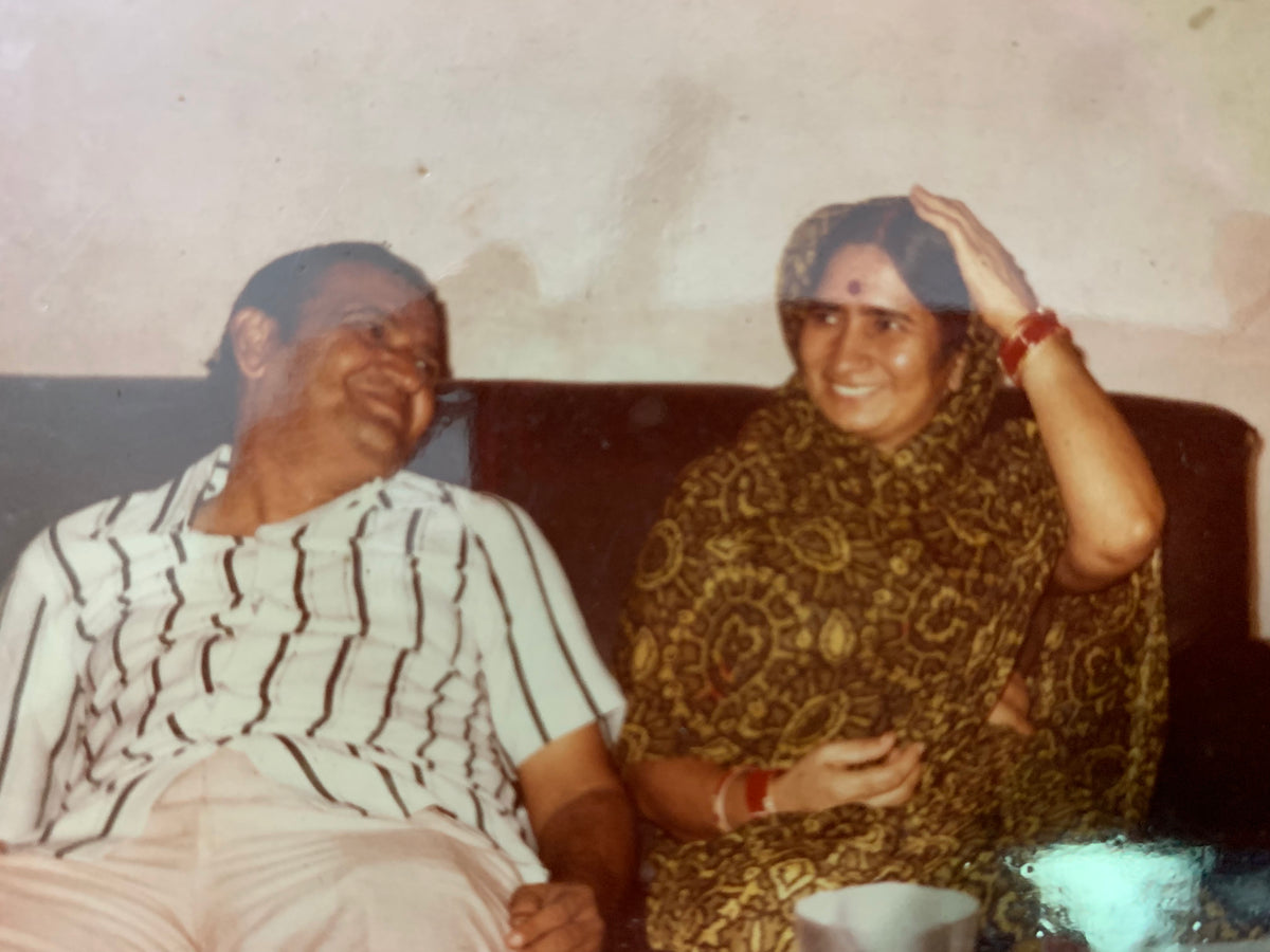 My mother, with my father